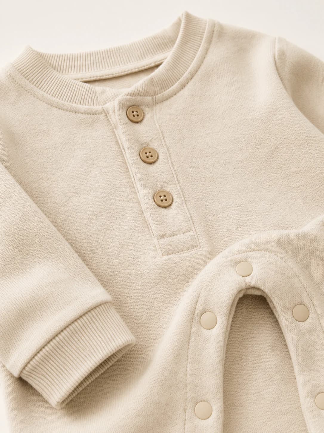 Organic Cotton Romper - Fabric Texture & Button Detail
